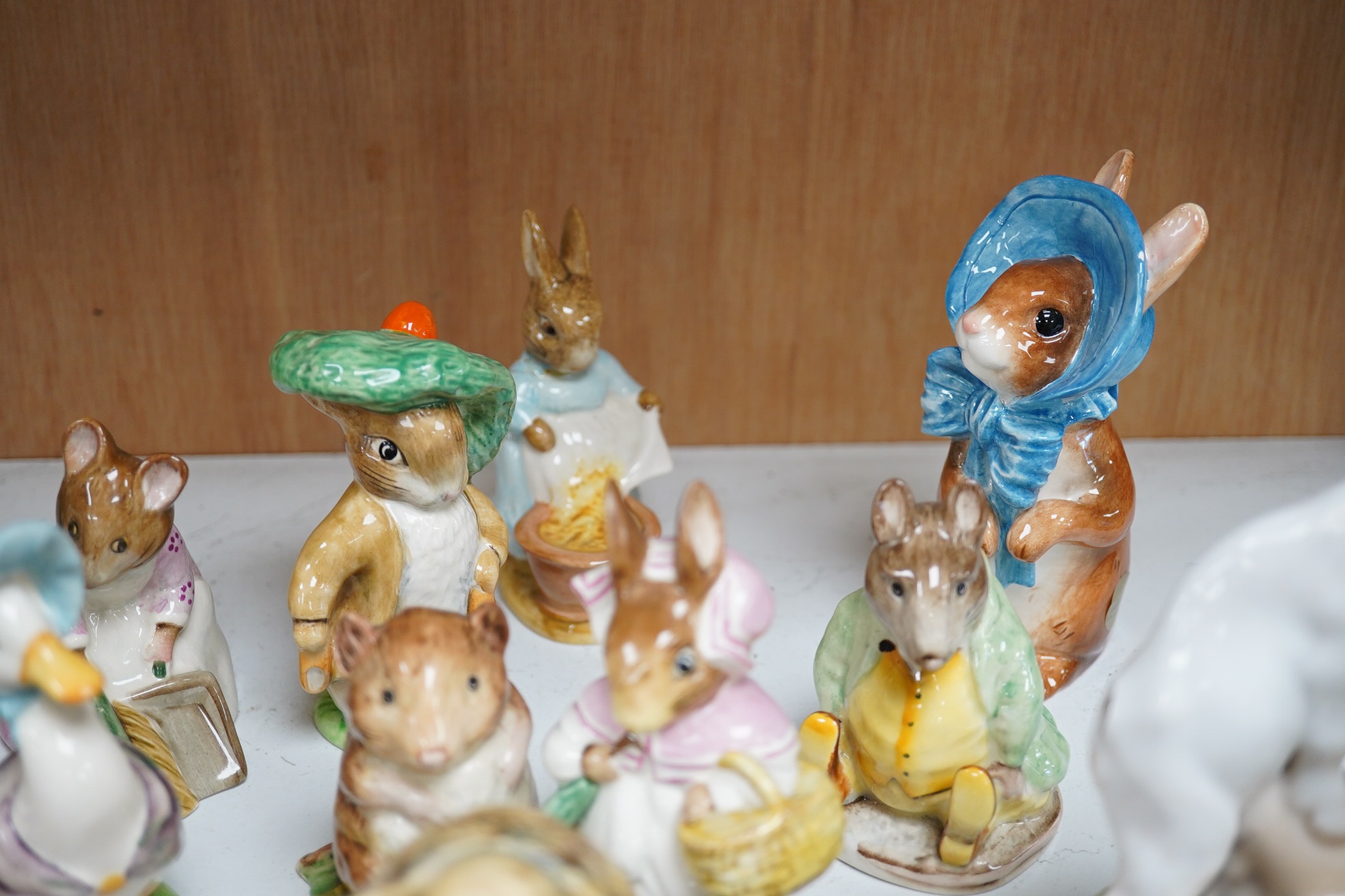 A collection Beswick ‘Bunnykins’ characters and two Royal Copenhagen ornaments (15). Tallest 13cm. Condition - good